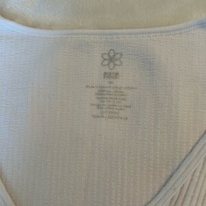 Aura White Ribbed Long Sleeved Bodysuit